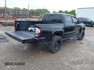 2018 Toyota Tacoma SR with VIN 3TMCZ5AN0JM136198, listed as a IAAI auction lot 41962668 with 71,813 mi miles. Bid and sale history available at carsss.com. Image 4.