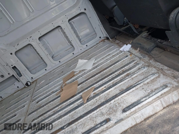 2023 Ford Transit Cargo with VIN 1FTBR3X86PKA69978, listed as a IAAI auction lot 41815672 with 60,590 mi miles and . Bid and sale history available at DreamBid. Image 8.