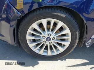 2017 Ford C-Max SE z VIN 1FADP5AU0HL115421, wystawiony jako IAAI lot #42216348 z przebiegiem 145 415 mil mil oraz . Historia ofert i sprzedaży dostępna na DreamBid. Obrazek 17.