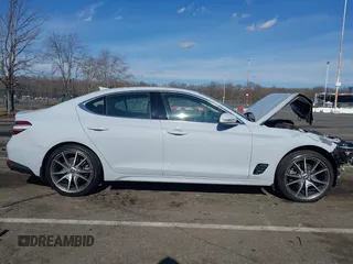 2022 Genesis G70 2.0T with VIN KMTG34TA7NU098169, listed as a IAAI auction lot 41669449 with 39,180 mi miles and . Bid and sale history available at DreamBid. Image 13.