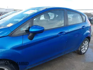 2011 Ford Fiesta SE with VIN 3FADP4EJ0BM173576, listed as a IAAI auction lot 42075691 with 128,835 mi miles. Bid and sale history available at carsss.com. Image 14.