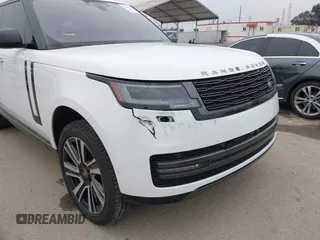 2023 Land Rover Range Rover SE z VIN SALKPBE73PA070434, wystawiony jako IAAI lot #42289191 z przebiegiem 14 920 mil mil oraz . Historia ofert i sprzedaży dostępna na DreamBid. Obrazek 6.