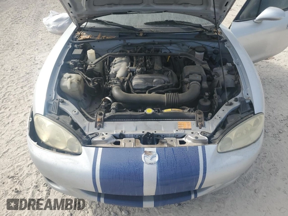 2003 Mazda MX-5 Miata Cloth with VIN JM1NB353430304103, listed as a Copart auction lot 50574245 with Not provided miles and Salvage title. Bid and sale history available at DreamBid. Image 11.