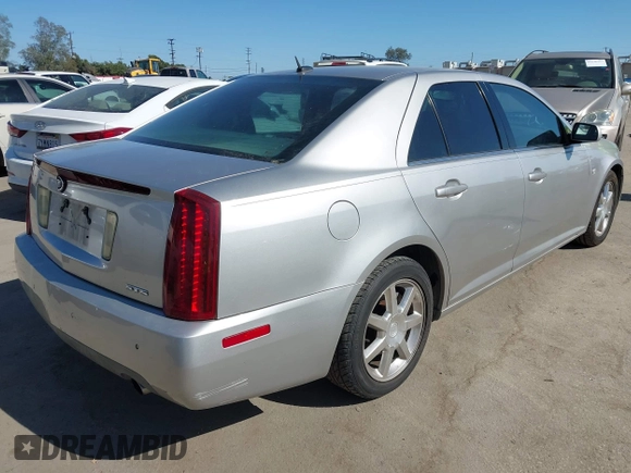 2005 Cadillac STS z VIN 1G6DW677350224198, wystawiony jako IAAI lot #42321639 z przebiegiem 122 208 mil mil oraz . Historia ofert i sprzedaży dostępna na DreamBid. Obrazek 4.