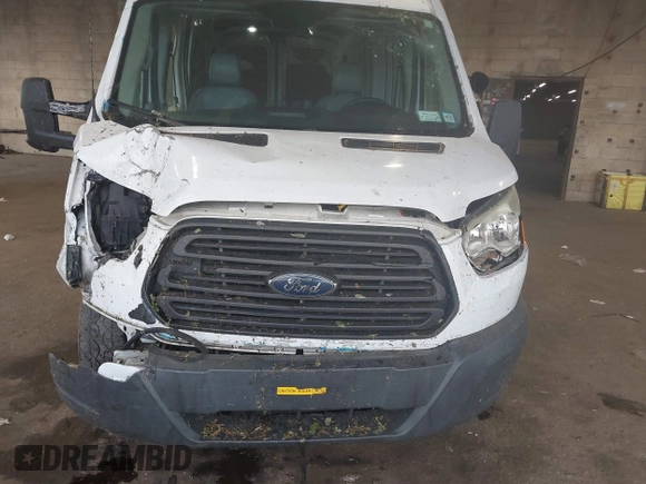 2015 Ford Transit Cargo z VIN 1FTNR2CM1FKA40154, wystawiony jako IAAI lot #42210986 z przebiegiem 164 324 mil mil oraz . Historia ofert i sprzedaży dostępna na DreamBid. Obrazek 6.