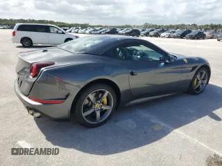 2015 Ferrari California T z VIN ZFF77XJA3F0206563, wystawiony jako Copart lot #73751534 z przebiegiem Nie podano mil oraz Szkody całkowita. Historia ofert i sprzedaży dostępna na DreamBid. Obrazek 3.