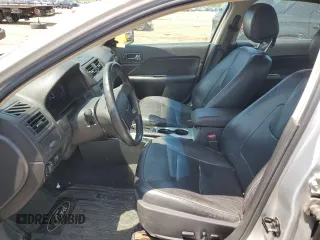 2012 Ford Fusion SEL z VIN 3FAHP0JA0CR282897, wystawiony jako Copart lot #58813155 z przebiegiem 170 464 mil mil oraz Czysty tytuł • Clean title. Historia ofert i sprzedaży dostępna na DreamBid. Obrazek 7.