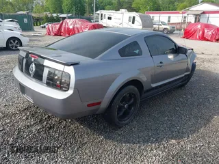 2007 Ford Mustang Deluxe with VIN 1ZVFT80N375332942, listed as a IAAI auction lot 42247026 with 91,352 mi miles and . Bid and sale history available at DreamBid. Image 4.