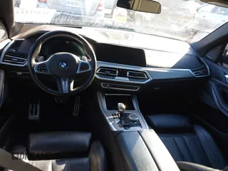 2020 BMW X5 M50i with VIN 5UXJU4C03LL227857, listed as a IAAI auction lot 41351112 with 65,325 mi miles and . Bid and sale history available at DreamBid. Image 22.
