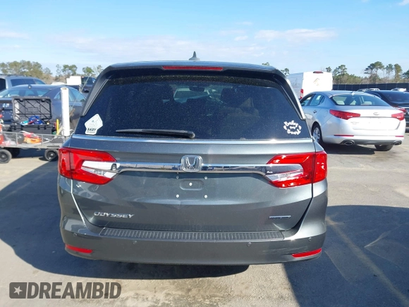 2020 Honda Odyssey Touring z VIN 5FNRL6H8XLB035047, wystawiony jako IAAI lot #41794343 z przebiegiem 57 537 mil mil oraz . Historia ofert i sprzedaży dostępna na DreamBid. Obrazek 16.