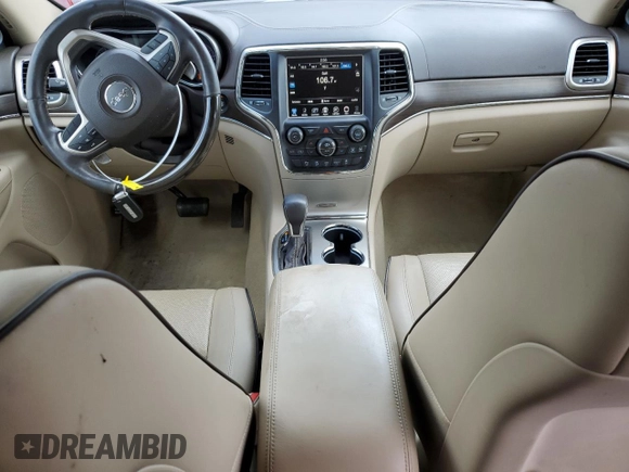 2017 Jeep Grand Cherokee Overland with VIN 1C4RJFCG5HC874130, listed as a Copart auction lot 65324695 with 101,588 mi miles and Salvage title. Bid and sale history available at DreamBid. Image 8.