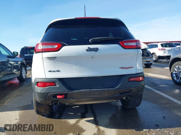 2018 Jeep Cherokee Trailhawk with VIN 1C4PJMBX7JD550173, listed as a IAAI auction lot 41094306 with 74,128 mi miles. Bid and sale history available at carsss.com. Image 16.