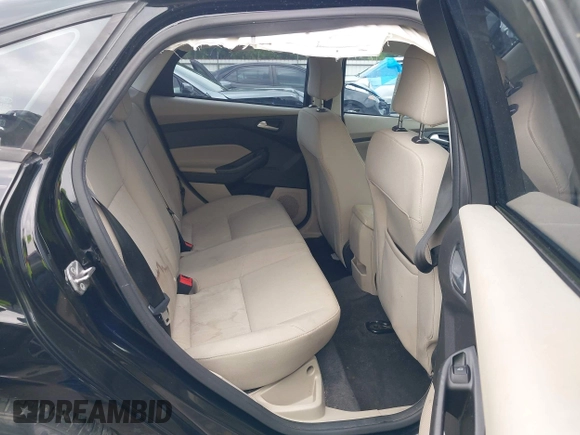 2018 Ford Focus SE with VIN 1FADP3F22JL311975, listed as a IAAI auction lot 41934856 with 68,974 mi miles. Bid and sale history available at carsss.com. Image 8.