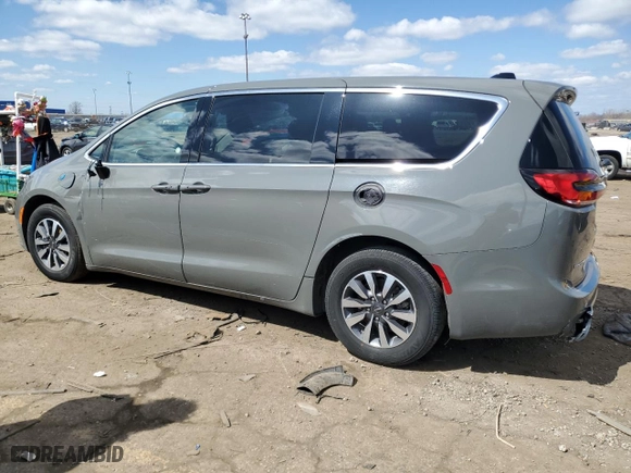 2023 Chrysler Pacifica Hybrid Touring L with VIN 2C4RC1L7XPR572495, listed as a Copart auction lot 51464745 with 33,397 mi miles and Clean Title. Bid and sale history available at carsss.com. Image 2.