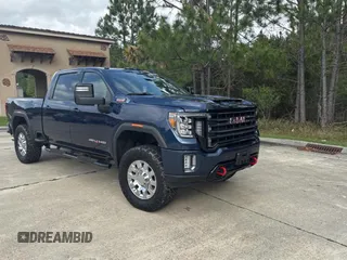 2020 GMC Sierra 2500HD AT4 z VIN 1GT49PEY7LF107692, wystawiony jako Copart lot #51387615 z przebiegiem 36 341 mil mil oraz Szkoda całkowita • Salvage title. Historia ofert i sprzedaży dostępna na DreamBid. Obrazek 1.