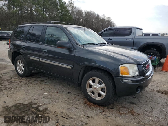 2003 GMC Envoy SLT z VIN 1GKDS13S332326838, wystawiony jako Copart lot #48888545 z przebiegiem 197 969 mil mil oraz Czysty tytuł • Clean title. Historia ofert i sprzedaży dostępna na DreamBid. Obrazek 4.