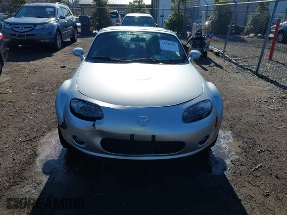 2007 Mazda MX-5 Miata Sport z VIN JM1NC25F170135777, wystawiony jako IAAI lot #41746586 z przebiegiem 107 302 mil mil oraz . Historia ofert i sprzedaży dostępna na DreamBid. Obrazek 12.