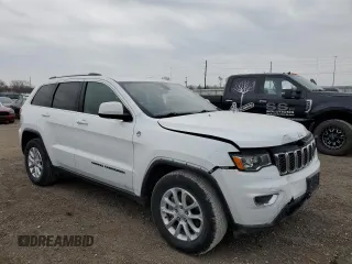 2021 Jeep Grand Cherokee Laredo X with VIN 1C4RJFAG4MC809721, listed as a Copart auction lot 53433595 with 136,257 mi miles and Salvage title. Bid and sale history available at DreamBid. Image 4.