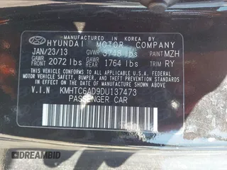 2013 Hyundai Veloster w/Gray Int with VIN KMHTC6AD9DU137473, listed as a IAAI auction lot 41846203 with 67,781 mi miles. Bid and sale history available at carsss.com. Image 9.