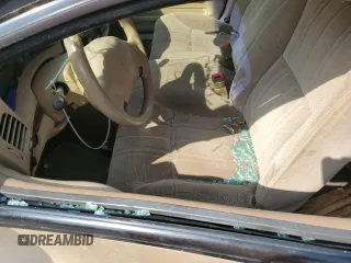 2000 Chevrolet Impala z VIN 2G1WF52E3Y9149110, wystawiony jako Copart lot #60172695 z przebiegiem Nie podano mil oraz Szkoda całkowita • Salvage title. Historia ofert i sprzedaży dostępna na DreamBid. Obrazek 7.