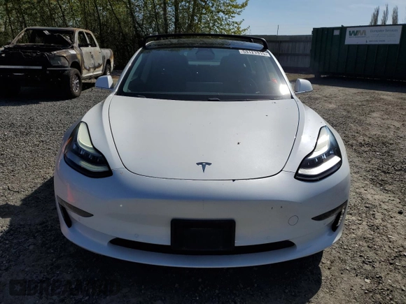 2019 Tesla Model 3 Mid Range with VIN 5YJ3E1EA0KF484178, listed as a Copart auction lot 53121915 with 64,929 mi miles and Salvage Title. Bid and sale history available at DreamBid. Image 5.
