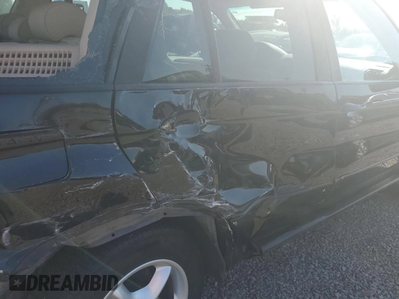 2003 BMW X5 3.0i with VIN 5UXFA53563LV96891, listed as a Copart auction lot 77636084 with 0 mi miles and Salvage Title. Bid and sale history available at carsss.com. Image 11.