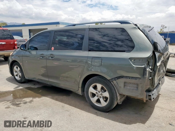 2014 Toyota Sienna LE AAS with VIN 5TDKK3DC4ES486440, listed as a Copart auction lot 62010355 with 401,453 mi miles and Salvage title. Bid and sale history available at DreamBid. Image 2.