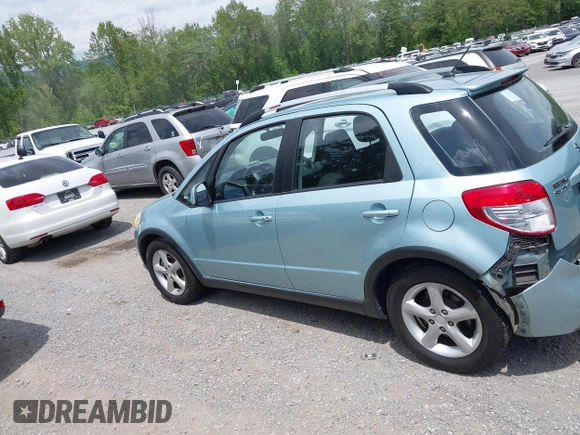 2009 Suzuki SX4 Touring AWD z VIN JS2YB417096201672, wystawiony jako IAAI lot #42209018 z przebiegiem 64 879 mil mil oraz . Historia ofert i sprzedaży dostępna na DreamBid. Obrazek 15.