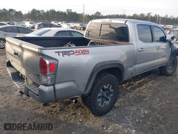 2021 Toyota Tacoma 4WD SR5 with VIN 5TFDZ5BN2MX063823, listed as a IAAI auction lot 41447098 with 52,538 mi miles. Bid and sale history available at carsss.com. Image 4.