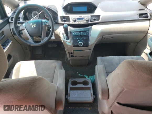 2012 Honda Odyssey LX с VIN 5FNRL5H29CB081071, выставлен на аукционе Copart как лот 56751545 с пробегом 233 240 миль миль и Списание • Salvage title. История ставок и продаж доступна на DreamBid. Изображение 8.