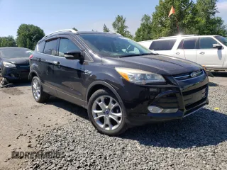 2015 Ford Escape Titanium with VIN 1FMCU9J94FUB31934, listed as a Copart auction lot 58327654 with 93,581 mi miles and Salvage Title. Bid and sale history available at carsss.com. Image 4.