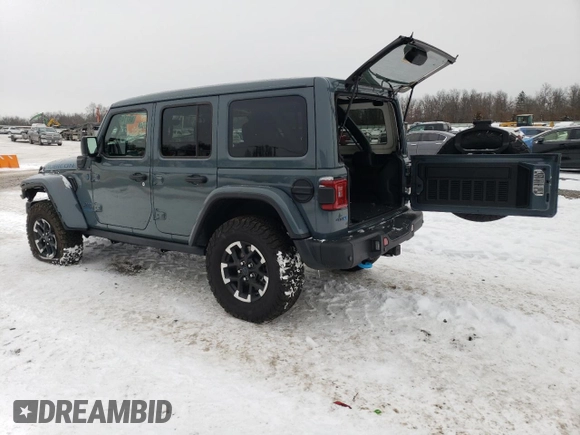 2024 Jeep Wrangler Rubicon with VIN 1C4RJXR66RW237347, listed as a Copart auction lot 88774995 with 18,018 mi miles and Salvage Title. Bid and sale history available at DreamBid. Image 2.