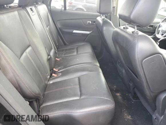 2013 Ford Edge SEL z VIN 2FMDK4JC4DBA69317, wystawiony jako Copart lot #77084544 z przebiegiem 108 808 mil mil oraz Szkoda całkowita • Salvage title. Historia ofert i sprzedaży dostępna na DreamBid. Obrazek 11.