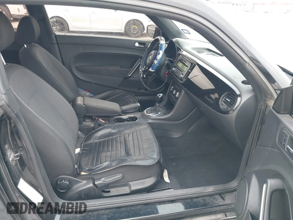 2013 Volkswagen Beetle Entry with VIN 3VWFP7AT8DM644840, listed as a IAAI auction lot 41387843 with 195,597 mi miles and . Bid and sale history available at DreamBid. Image 5.