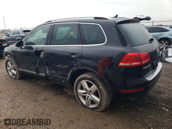 2013 Volkswagen Touareg Lux with VIN WVGEF9BP0DD002814, listed as a Copart auction lot 83015434 with 143,320 mi miles and Salvage Title. Bid and sale history available at DreamBid. Image 2.