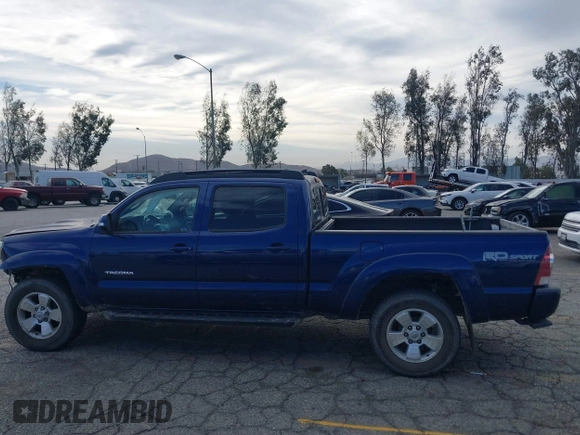 2015 Toyota Tacoma with VIN 3TMMU4FN0FM077148, listed as a IAAI auction lot 41274934 with 112,617 mi miles and . Bid and sale history available at DreamBid. Image 15.