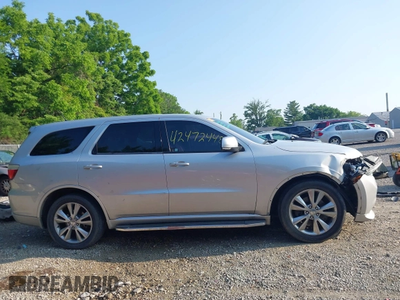 2012 Dodge Durango R/T with VIN 1C4SDJCT3CC308629, listed as a IAAI auction lot 42472448 with 159,467 mi miles and . Bid and sale history available at DreamBid. Image 14.