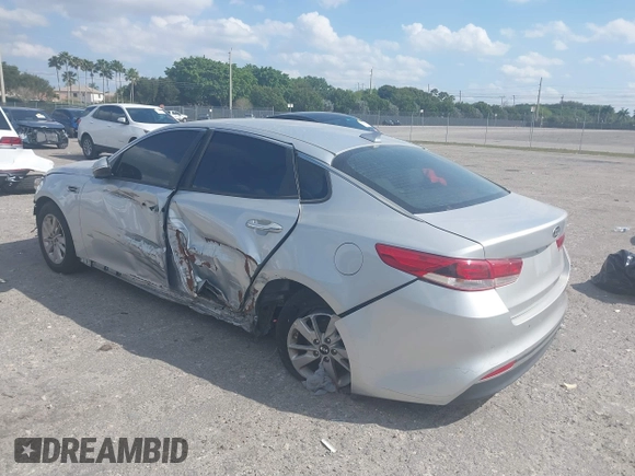 2018 Kia Optima LX with VIN 5XXGT4L39JG235287, listed as a IAAI auction lot 41802035 with 96,412 mi miles. Bid and sale history available at carsss.com. Image 3.