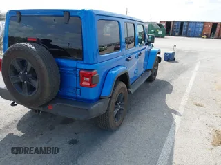 2023 Jeep Wrangler Sahara with VIN 1C4HJXEG4PW584800, listed as a IAAI auction lot 41908392 with 22,108 mi miles and . Bid and sale history available at DreamBid. Image 4.