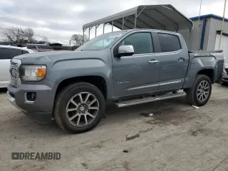 2020 GMC Canyon 4WD Denali with VIN 1GTG6EENXL1164823, listed as a Copart auction lot 83332484 with 63,444 mi miles and Salvage Title. Bid and sale history available at carsss.com. Image 1.