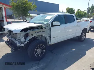 2019 GMC Canyon 2WD SLE z VIN 1GTG5CEN1K1210562, wystawiony jako IAAI lot #42419697 z przebiegiem 115 702 mil mil oraz . Historia ofert i sprzedaży dostępna na DreamBid. Obrazek 2.