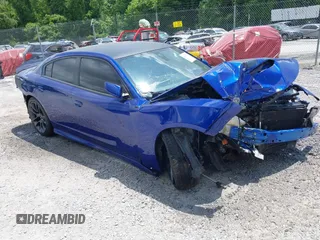 2022 Dodge Charger R/T with VIN 2C3CDXCT9NH232197, listed as a IAAI auction lot 42415748 with 46,500 mi miles and . Bid and sale history available at DreamBid. Image 1.