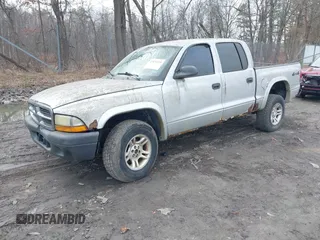 2004 Dodge Dakota Sport with VIN 1D7HG38K54S634958, listed as a IAAI auction lot 41831018 with 135,917 mi miles. Bid and sale history available at carsss.com. Image 2.