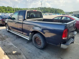 1999 Ford F-150 with VIN 1FTZX1729XNB58298, listed as a Copart auction lot 62369755 with 165,150 mi miles and Clean title. Bid and sale history available at DreamBid. Image 2.