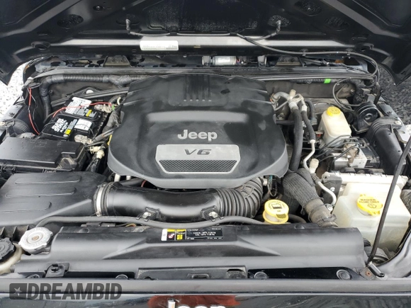 2018 Jeep Wrangler Unlimited Sport S with VIN 1C4BJWDG0JL818800, listed as a Copart auction lot 56648505 with 114,011 mi miles and Salvage Title. Bid and sale history available at DreamBid. Image 11.