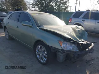 2010 Toyota Avalon XL with VIN 4T1BK3DB9AU354427, listed as a IAAI auction lot 41614018 with Not Provided miles and . Bid and sale history available at carsss.com. Image 1.