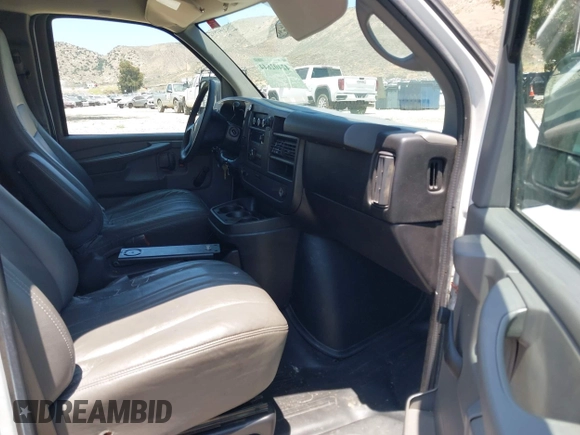 2012 Chevrolet Express Cargo with VIN 1GCSGAFXXC1182349, listed as a IAAI auction lot 42402644 with 204,411 mi miles and . Bid and sale history available at DreamBid. Image 5.