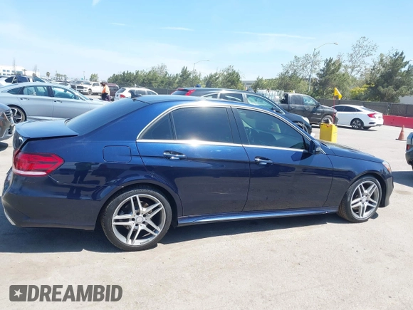 2014 Mercedes-Benz E 350 Sport with VIN WDDHF5KB2EA997989, listed as a IAAI auction lot 42067922 with 57,119 mi miles and . Bid and sale history available at DreamBid. Image 12.