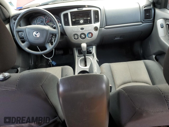 2005 Mazda Tribute S with VIN 4F2CZ04125KM19257, listed as a Copart auction lot 67370664 with 140,348 mi miles and Salvage Title. Bid and sale history available at DreamBid. Image 8.