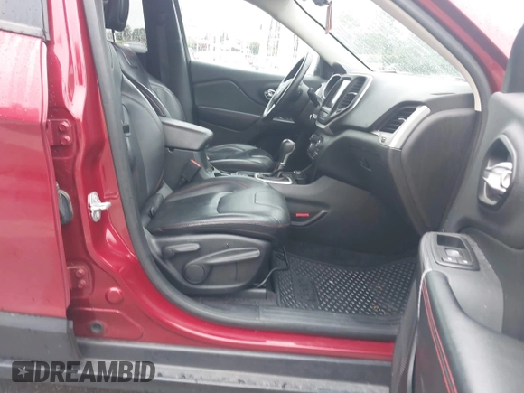 2015 Jeep Cherokee Trailhawk with VIN 1C4PJMBSXFW667469, listed as a IAAI auction lot 42438006 with 127,136 mi miles and . Bid and sale history available at DreamBid. Image 5.